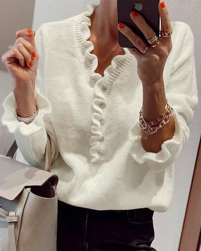 Lisa | Elegante trui met knopen in een effen kleur