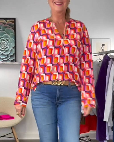 Mila | Blouse in contrastkleuren en geometrische patronen