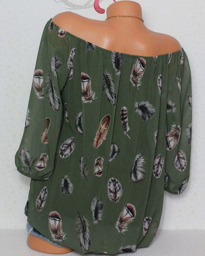 Maud | Losvallende blouse met verenprint