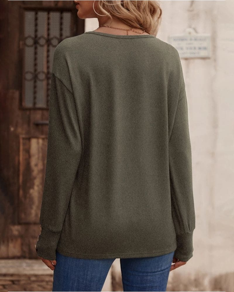 Jara - Een blouse met lange mouwen en een V-hals