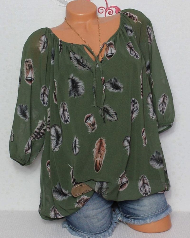 Maud | Losvallende blouse met verenprint