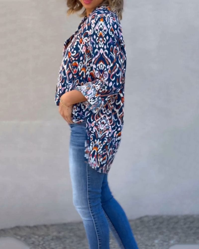 Mila | Blouse met een V-hals en bloemige lange mouwen