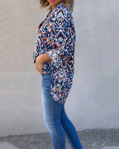Mila | Blouse met een V-hals en bloemige lange mouwen