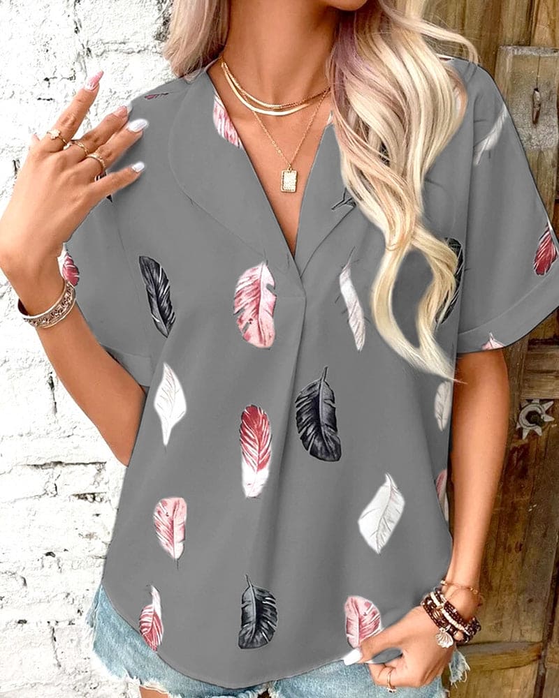 Inge - Blouse met veren en korte mouwen