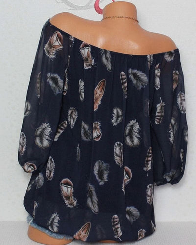 Maud | Losvallende blouse met verenprint
