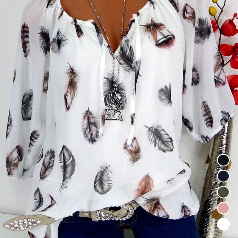 Maud | Losvallende blouse met verenprint