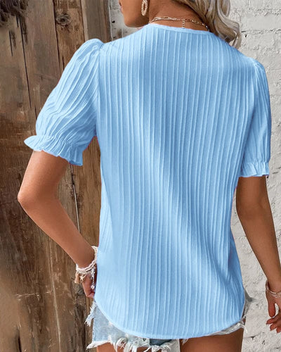 Fleur - Elegante kanten blouse met V-hals