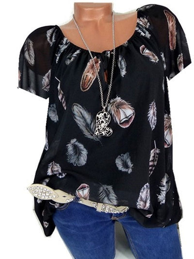 Maud | Losvallende blouse met verenprint