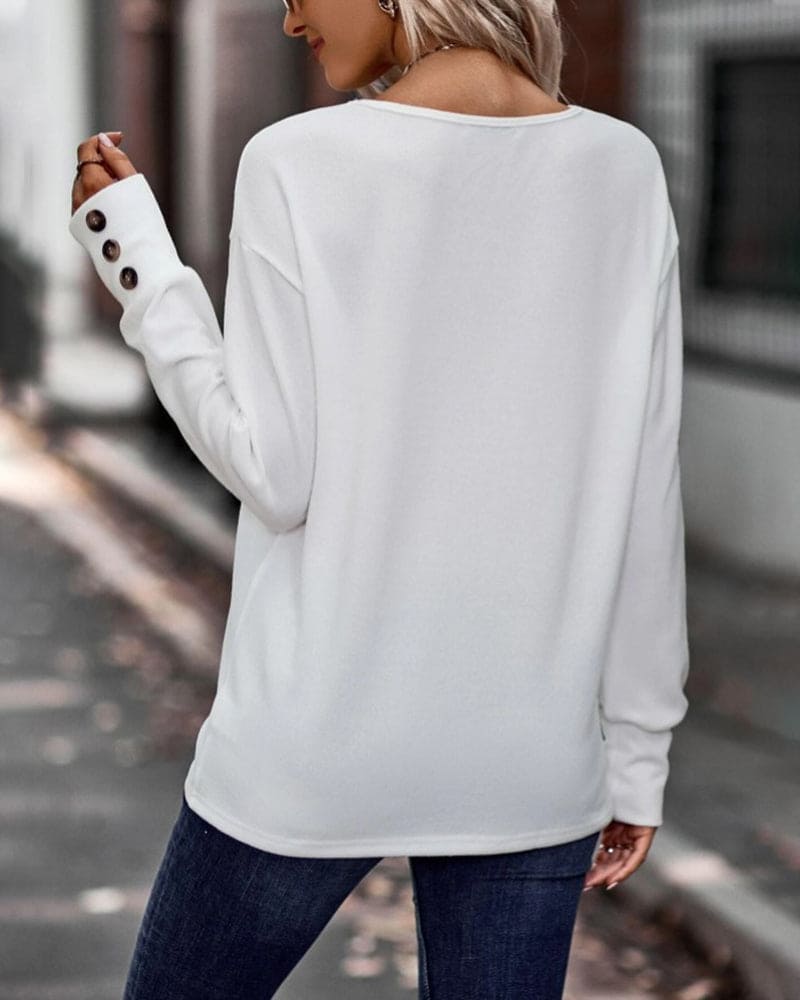 Jara - Een blouse met lange mouwen en een V-hals