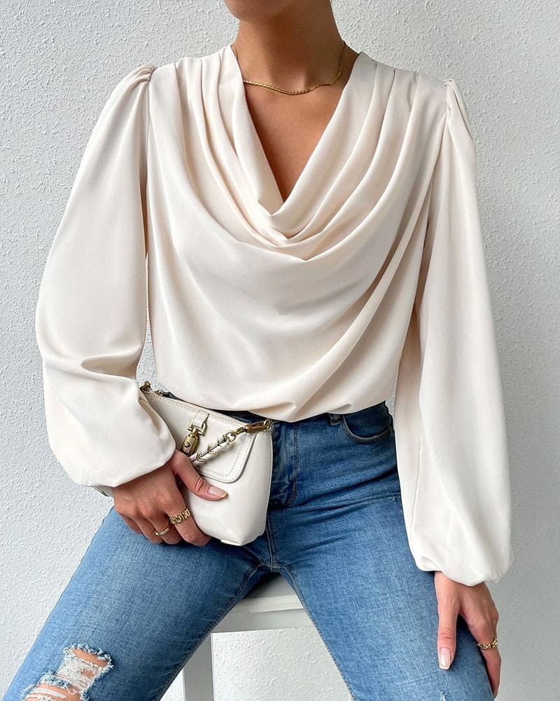 Demi - Een effen blouse met een V-hals