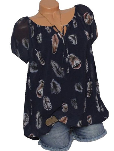 Maud | Losvallende blouse met verenprint
