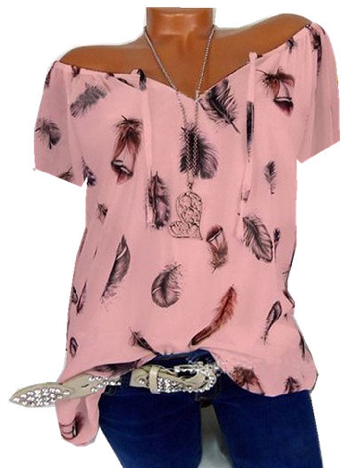 Maud | Losvallende blouse met verenprint