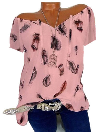 Maud | Losvallende blouse met verenprint