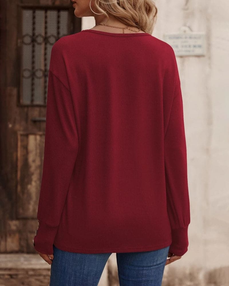 Jara - Een blouse met lange mouwen en een V-hals