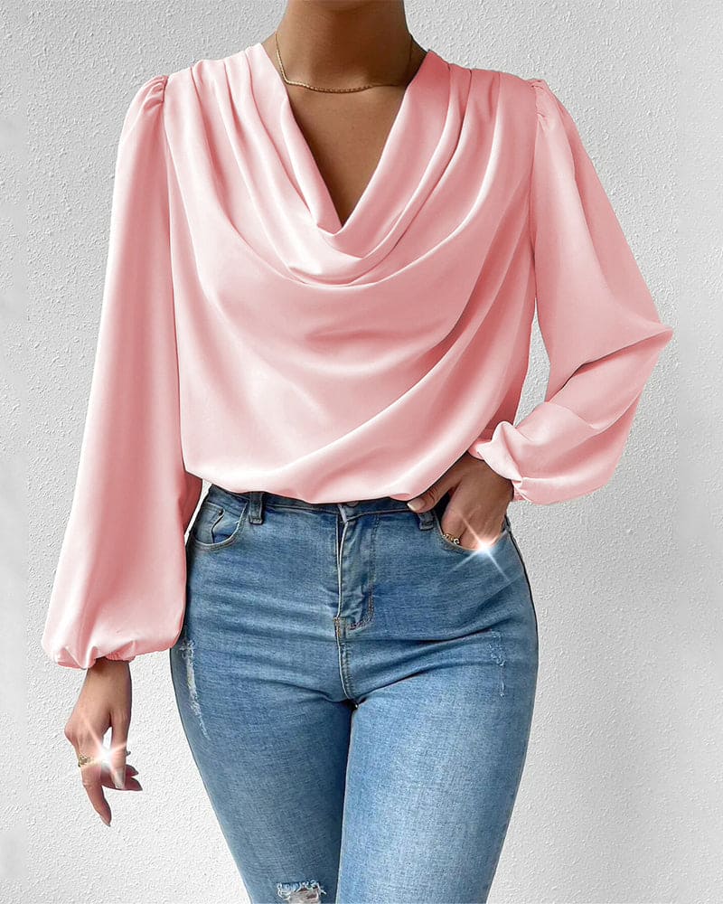 Demi - Een effen blouse met een V-hals