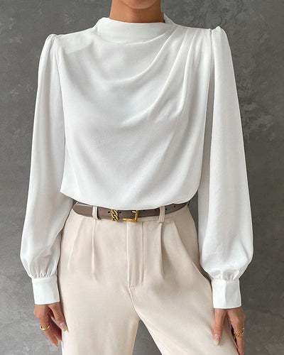 Isa - Een effen blouse met een gerimpelde kraag en een opstaande kraag