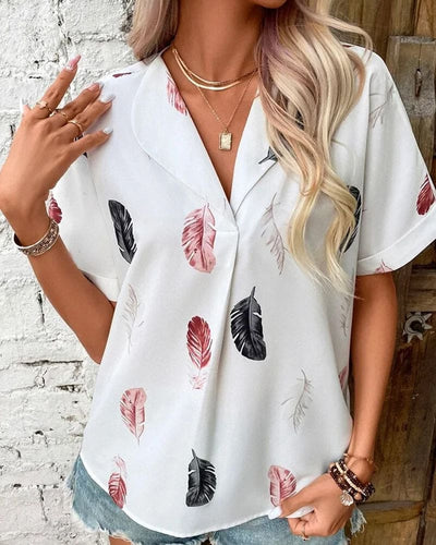 Inge - Blouse met veren en korte mouwen