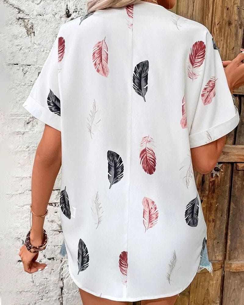 Inge - Blouse met veren en korte mouwen