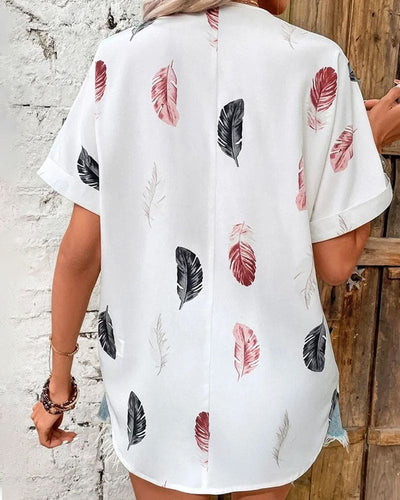 Inge - Blouse met veren en korte mouwen