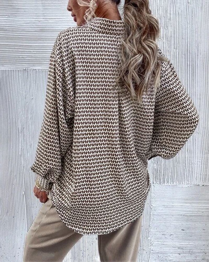 Mirthe | Blouse met print en kleppen