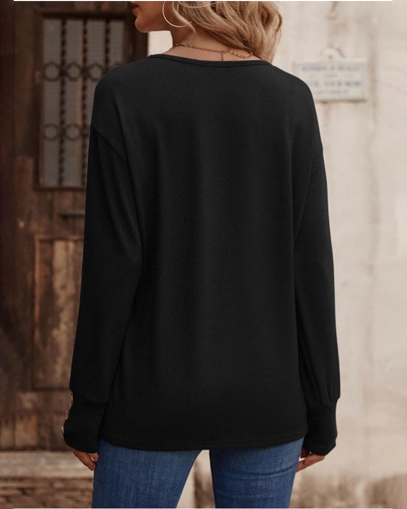 Jara - Een blouse met lange mouwen en een V-hals