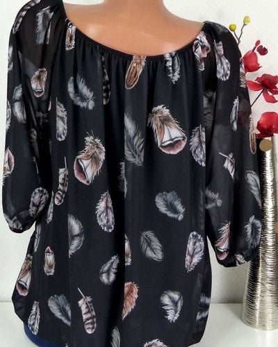 Maud | Losvallende blouse met verenprint