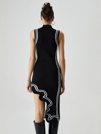Tessel | Gebreide midi-jurk met asymmetrische contrasterende bies