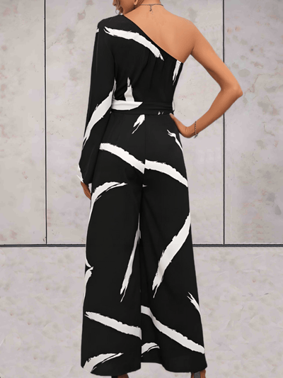 Bailey - Zwart jumpsuit met zijschouder en witte verfstrepen