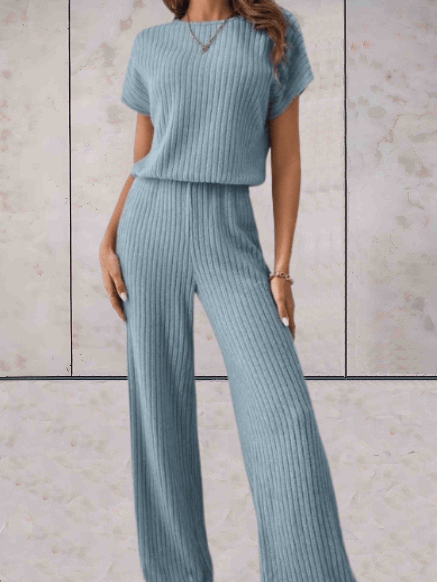 Polly - Effen jumpsuit met korte mouwen en geribbeld design