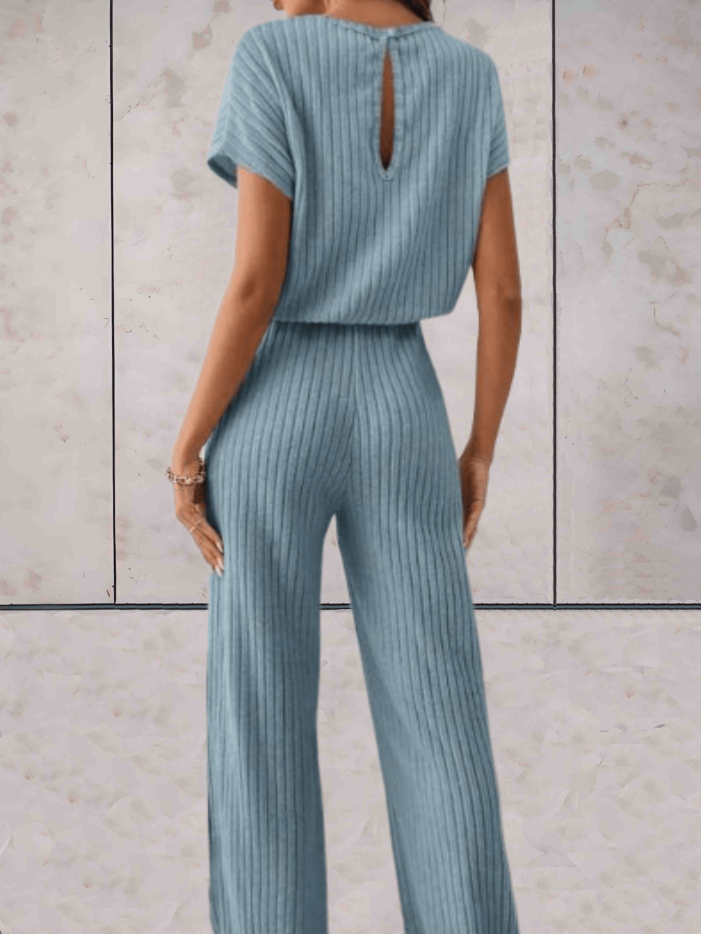 Polly - Effen jumpsuit met korte mouwen en geribbeld design