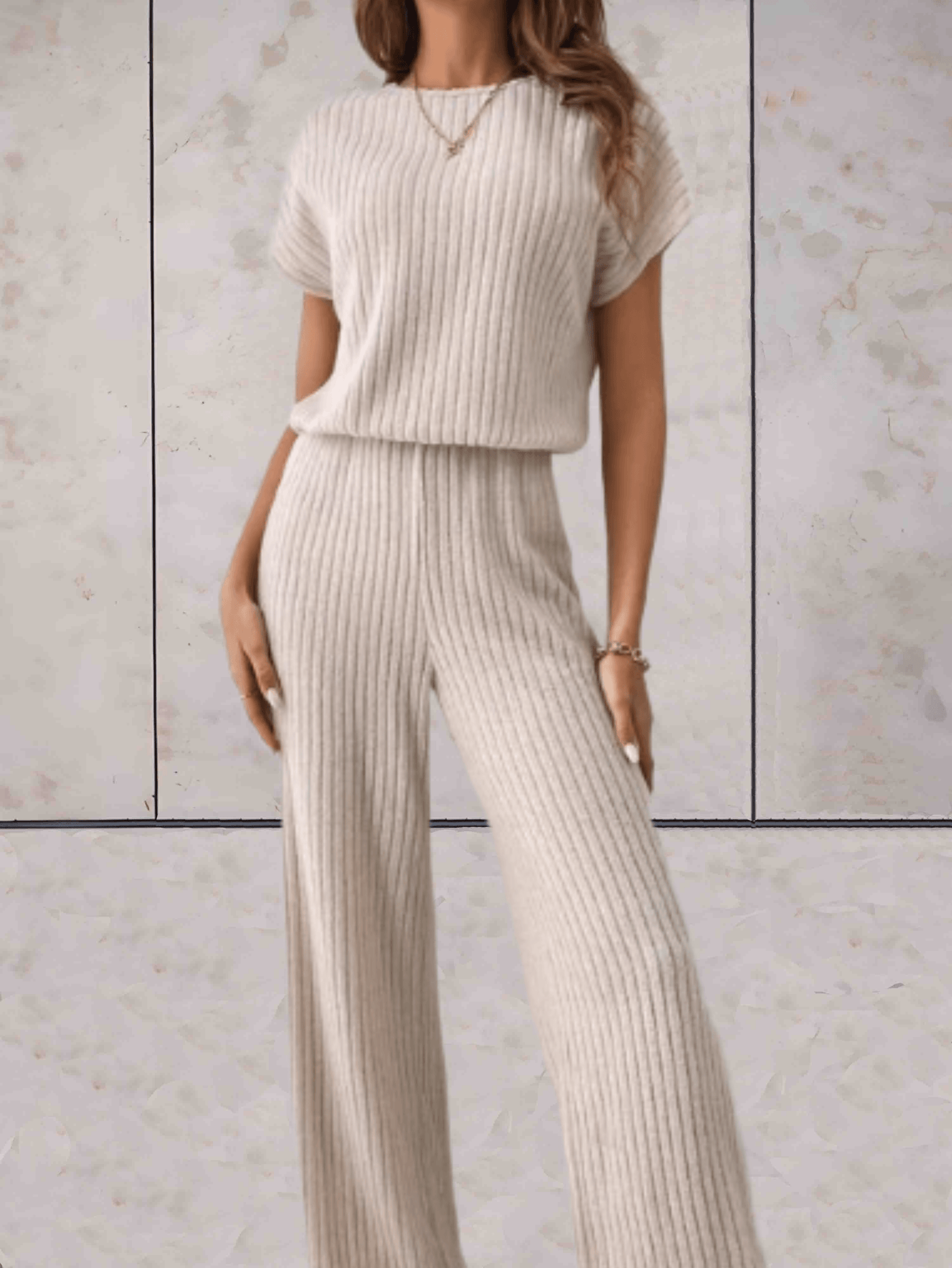 Polly - Effen jumpsuit met korte mouwen en geribbeld design