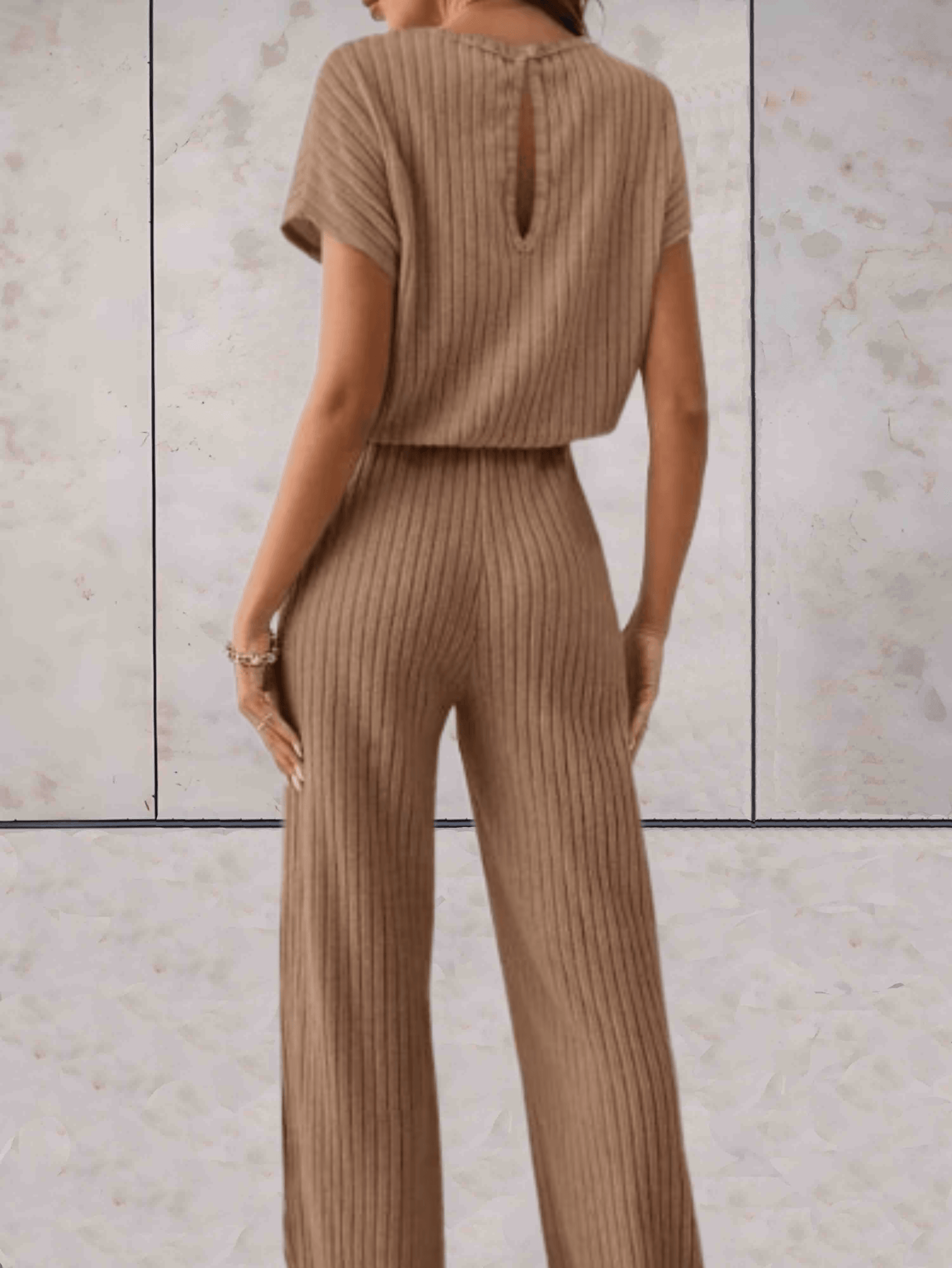 Polly - Effen jumpsuit met korte mouwen en geribbeld design