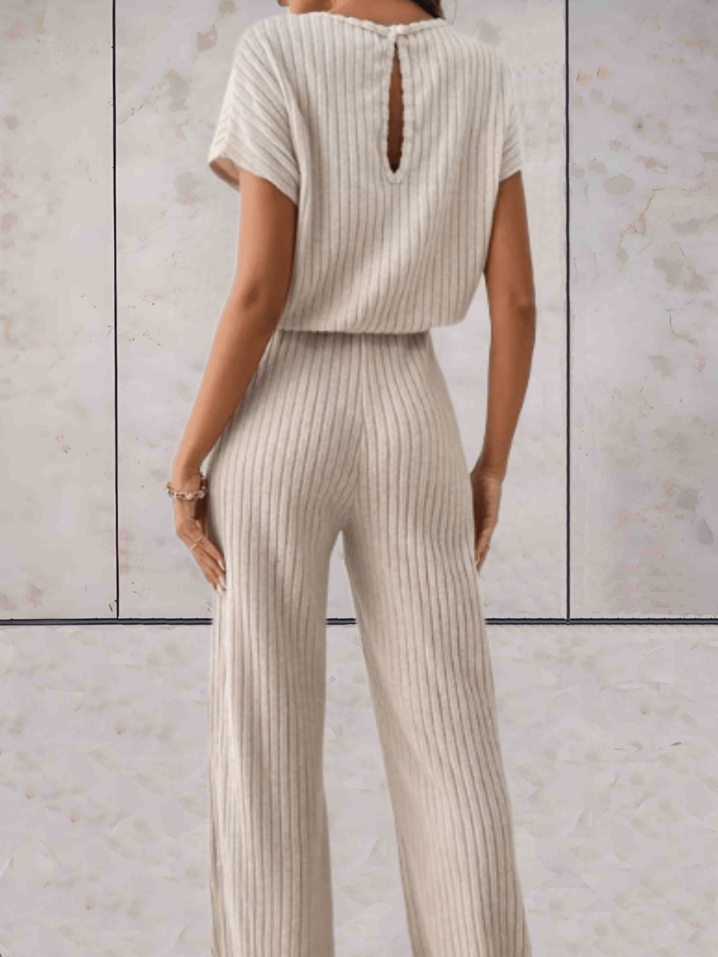 Polly - Effen jumpsuit met korte mouwen en geribbeld design