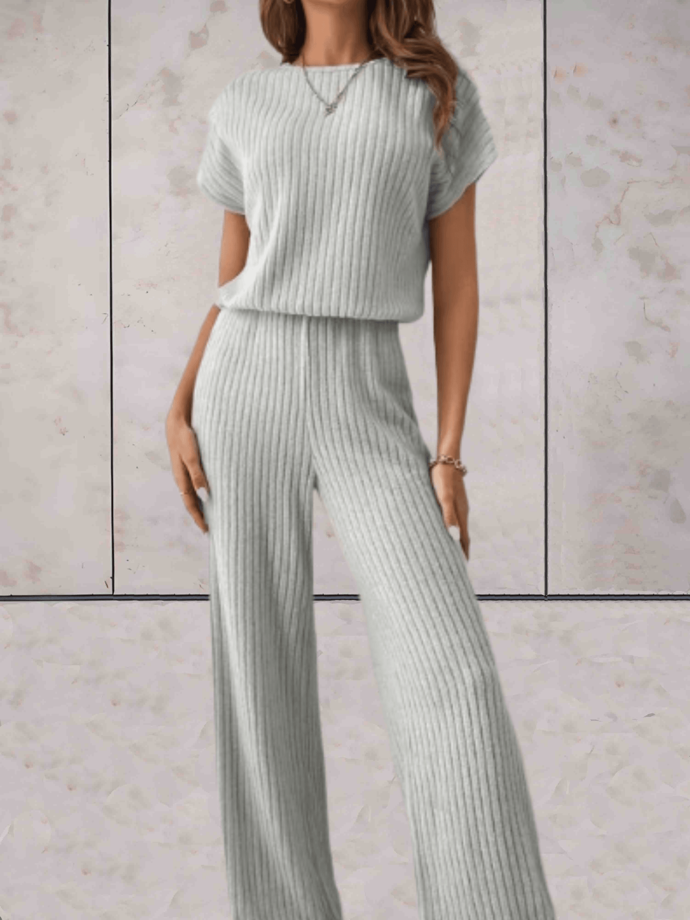 Polly - Effen jumpsuit met korte mouwen en geribbeld design