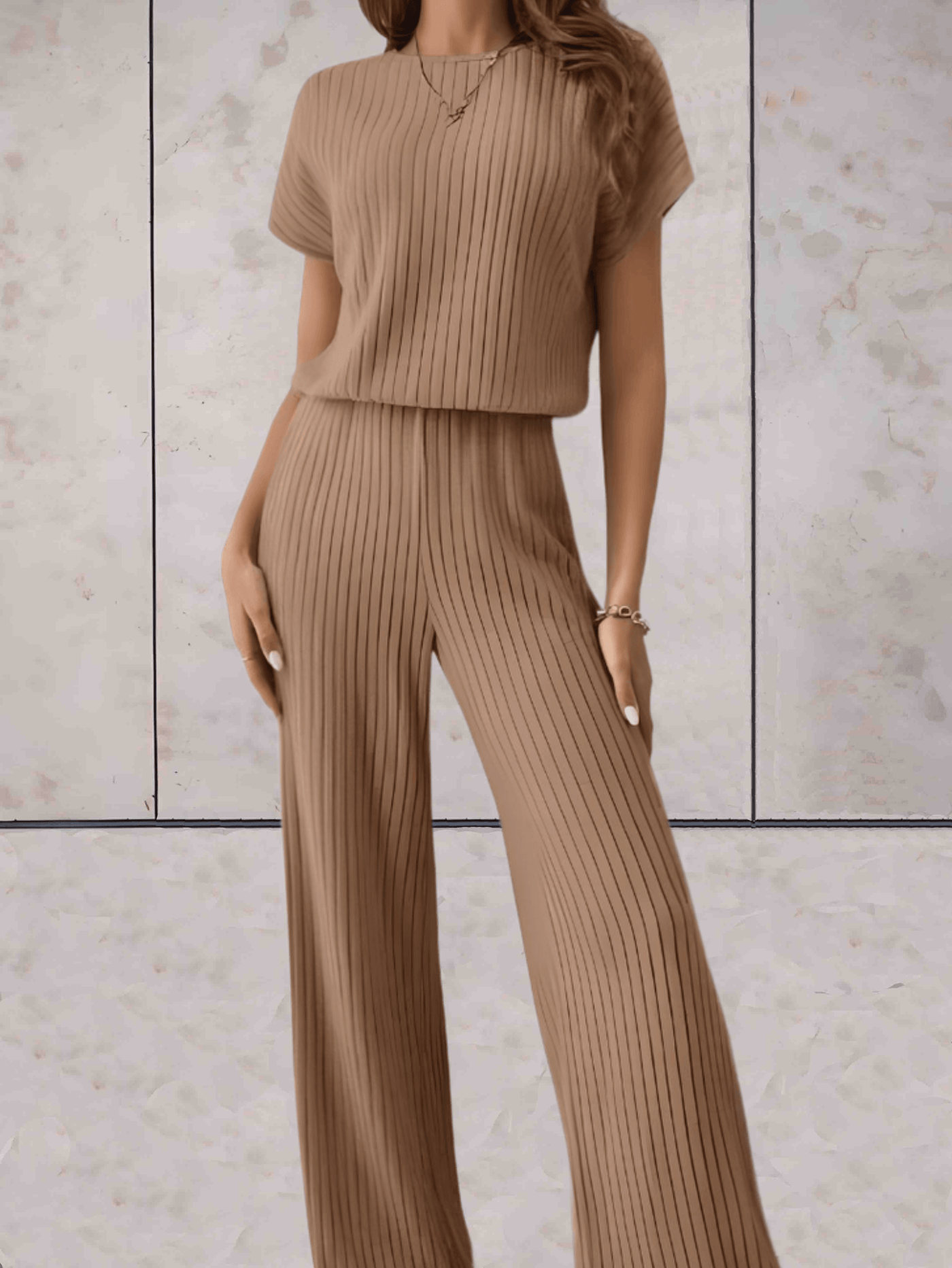 Polly - Effen jumpsuit met korte mouwen en geribbeld design