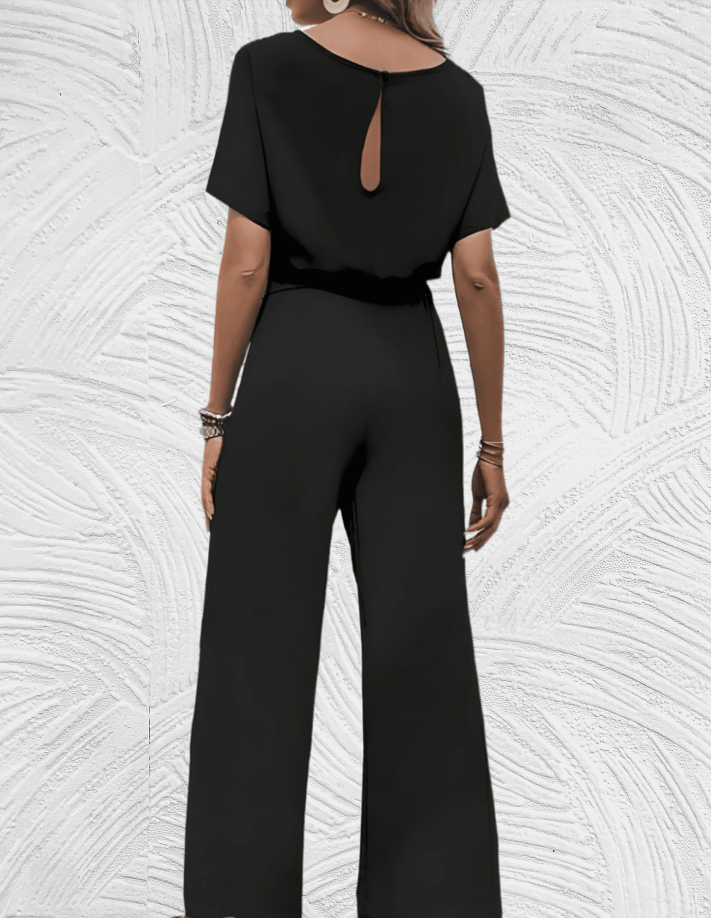 Trace | Mooi aansluitende jumpsuit met wijde mouwen