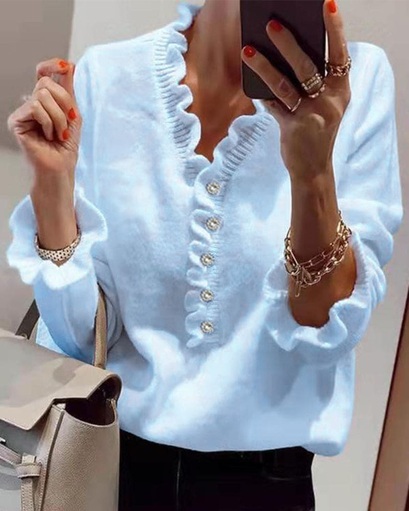 Lisa | Elegante trui met knopen in een effen kleur