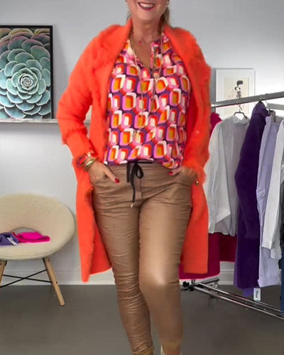 Mila | Blouse in contrastkleuren en geometrische patronen