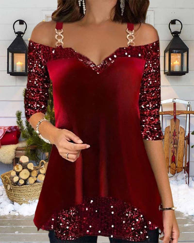 Yara | Kerstblouse met pailletten en open schouders