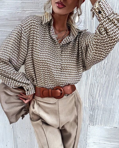 Mirthe | Blouse met print en kleppen