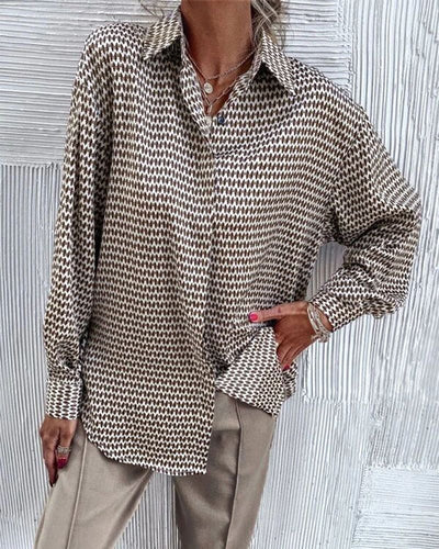 Mirthe | Blouse met print en kleppen