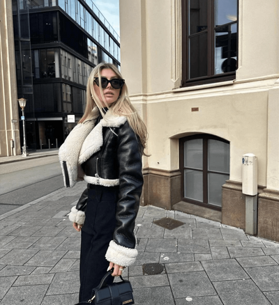 Claudia - stijlvolle look voor koude dagen met jas van imitatiebont