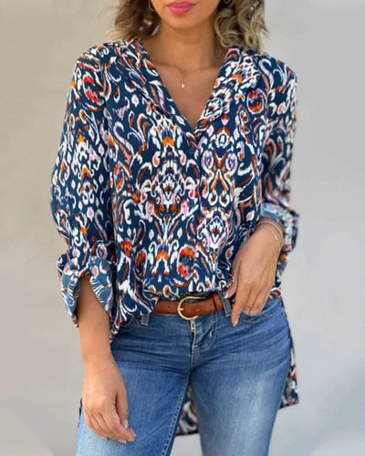 Mila | Blouse met een V-hals en bloemige lange mouwen