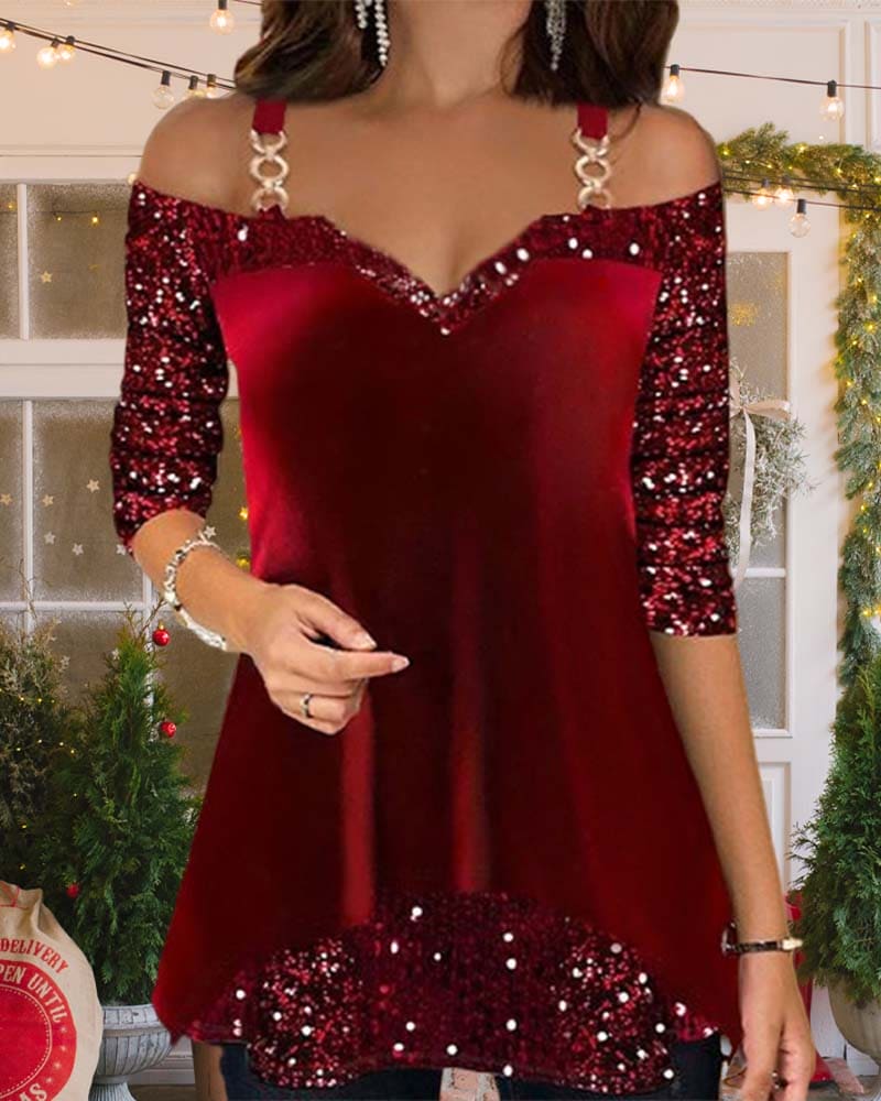 Yara | Kerstblouse met pailletten en open schouders