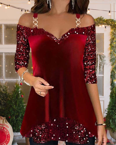 Yara | Kerstblouse met pailletten en open schouders