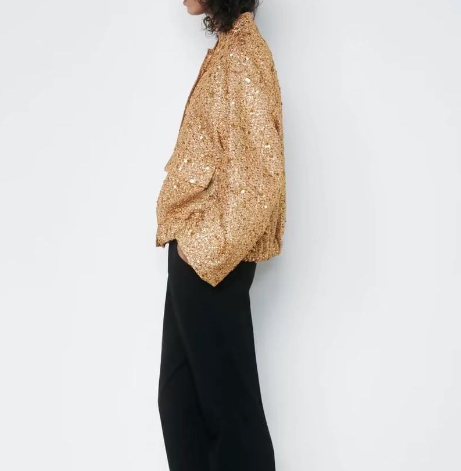 Isabella - Elegante oversized jas met goudkleurige pailetten