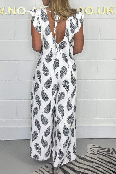 Zoë | Jumpsuit met kapmouwen en vetersluiting met print