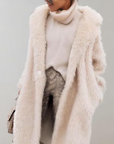 Isabella - Lang en oversized winterjas van imitatieleer met zijzakken